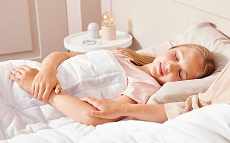 Waarom een verzwaringsdeken jouw slaap verbetert