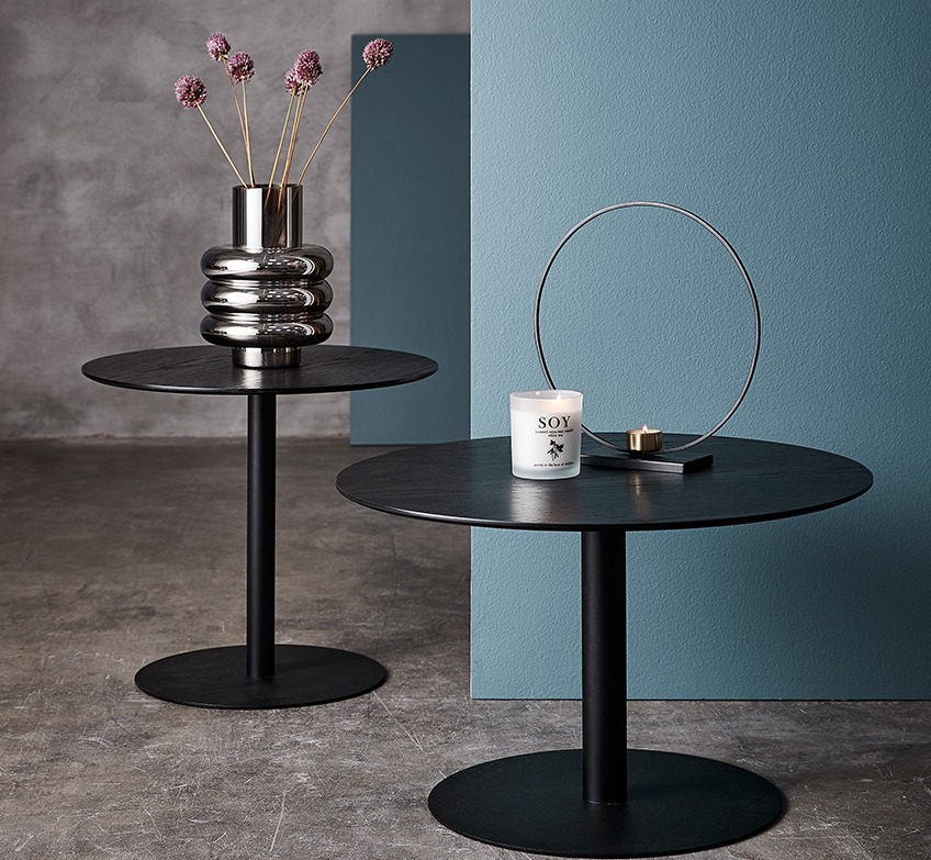 Two end tables in black with vase, scented candle and tealight holder